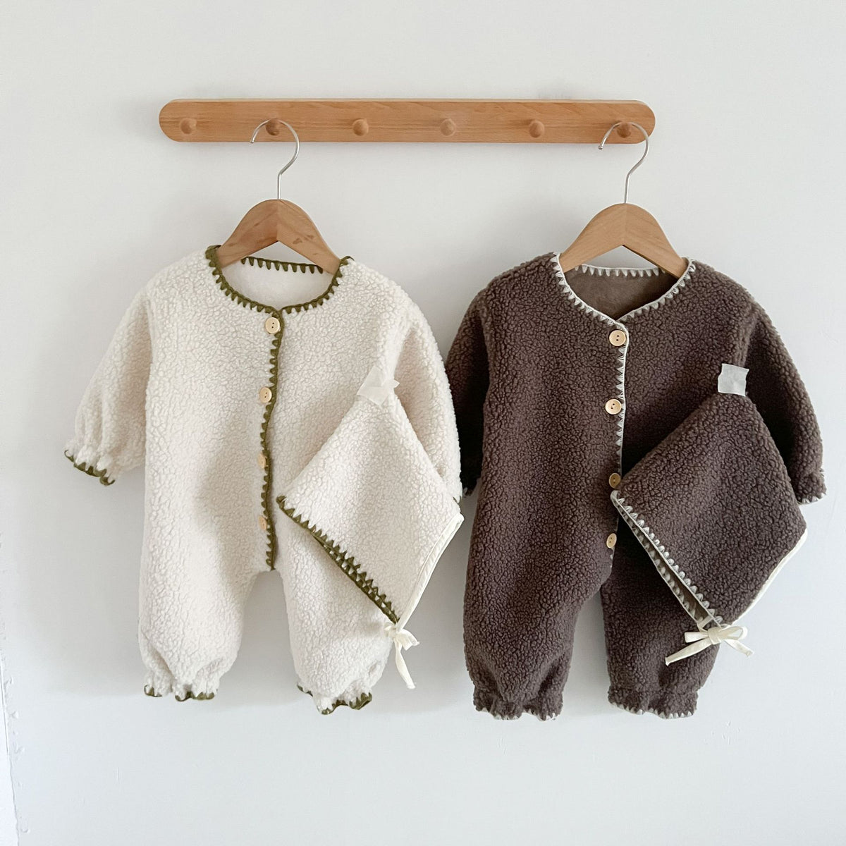 Fleece-lined cotton baby romper with matching hat in Western style